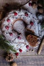 Holiday dessert. Traditional homemade christmas chocolate cake with cherry on wooden table Royalty Free Stock Photo