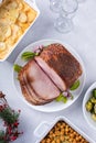 Holiday dinner with honey glazed spiral cut ham and all the sides Royalty Free Stock Photo