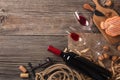 Holiday Dinner setting with red wine and creaming cheese on rustic wood. Top view with space for your greetings Royalty Free Stock Photo