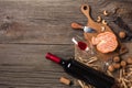 Holiday Dinner setting with red wine and creaming cheese on rustic wood. Top view with space for your greetings Royalty Free Stock Photo