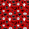Halloween seamless pattern made up of pumpkins, crows, bats, cats, graves, skulls, ghosts and brooms. Royalty Free Stock Photo