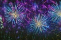 Holiday Fireworks with sparks, colored smoke and bright nebula on black sky as stars, universe, comets