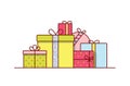 Holiday gift boxes wrapped in bright colored paper and decorated with ribbons and bows. Pile of packed festive presents Royalty Free Stock Photo