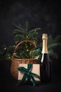 Holiday gift hamper with craft gift and sparkline wine on black. Christmas present.
