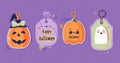 Holiday gift tags this year with ghosts, jack-o-lantern faces, sweets, witch hats, devils, and cauldrons. This is an Royalty Free Stock Photo