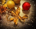 Holiday gold red silver tree balls decoration on brown background snowflakes and blurred yellow light background with wishes quot