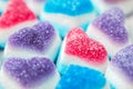 Holiday gummy candy, red-and-blue hearts, sour sweets