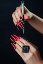 Holiday halloween or new year nail art design ideas. Beauty Fashion Hands Trendy Stylish Colorful manicure. Black Red fingers Royalty Free Stock Photo