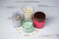 Holiday hand-poured soy candles in a variety of containers.