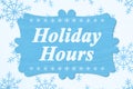 Holiday Hours message on a wood sign