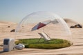 Holiday idyll with sun lounger and parasol on a small grassy area under a glass dome in the middle of the desert Air conditioning