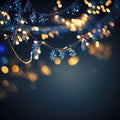 Holiday illumination and decoration concept - christmas garland bokeh lights over