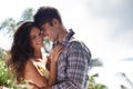 Holiday loving. Portrait of an affectionate young couple on holiday. Royalty Free Stock Photo