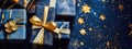 Holiday luxury gift boxes with golden bow ribbons and decor on blue background.Christmas gift wrapping