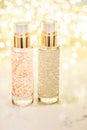 Holiday make-up base gel, serum emulsion, lotion bottle and golden glitter, luxury skin and body care cosmetics for beauty brand Royalty Free Stock Photo