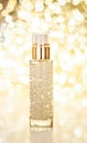 Holiday make-up base gel, serum emulsion, lotion bottle and golden glitter, luxury skin and body care cosmetics for beauty brand Royalty Free Stock Photo