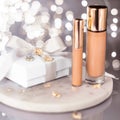 Holiday make-up foundation base, concealer and white gift box, luxury cosmetics present and blank label products for beauty brand