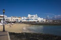 Holiday makers on vacation on the town beach Corralejo Fuerteventura Canary-islands Spain Royalty Free Stock Photo