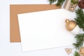 Holiday mockup for christmas card or letter, top view and flat lay, new year concept christmas tree decorations, pine branches and Royalty Free Stock Photo