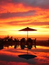 Holiday mood under the shaded umbrella with beautiful sunset