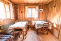 Holiday in the mountains: Rustic old wooden interior of a cabin or hut Royalty Free Stock Photo