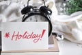 Holiday Note Cover on Alarm Clock Royalty Free Stock Photo
