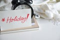 Holiday Note Cover Alarm Clock on White Background Royalty Free Stock Photo