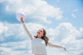 Holiday objects. Happy child with colorful air balloons over blue sky background. express positive emotions. just have Royalty Free Stock Photo