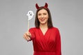 Happy woman in red halloween costume of devil Royalty Free Stock Photo