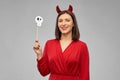 Happy woman in red halloween costume of devil Royalty Free Stock Photo