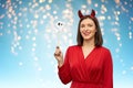 Happy woman in red halloween costume of devil Royalty Free Stock Photo