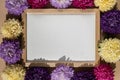 Holiday postcard greeting card empty paper note frame around mixed colorful flowers. Copy space mockup template Royalty Free Stock Photo