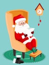 Holiday preparation. Happy old kind bearded Santa Claus wearing hat, glasses, sitting in the arm chair and reading a letter or Royalty Free Stock Photo