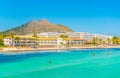 Holiday resorts stretched alongside Alcudia beach on Mallorca, Spain