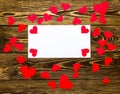 Holiday/romantic/wedding/valentine Day background with small paper red hearts and blank message card