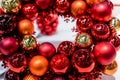 Holiday round frame, red and orange glass Christmas balls, isolated on blurred background.Happy new year decoration for Royalty Free Stock Photo