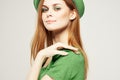 Holiday Saint Patrick`s Day shamrock girl fun Green clothing light background Royalty Free Stock Photo