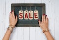 Holiday Sale. Female hands with jewelry. Fashion accessories