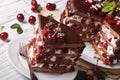 Holiday sliced cherry cake on a plate close-up. Horizontal Royalty Free Stock Photo
