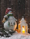 Holiday Snowman and Glowing Lantern