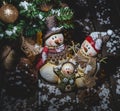Holiday Snowmen Under Christmas Tree Royalty Free Stock Photo