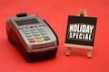 Holiday Special sale sign with credit card swipe machine