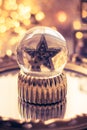 Holiday star in glass ball, Christmas decorations Royalty Free Stock Photo