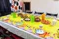 Holiday table with snacks, children holiday celebration