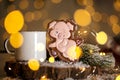 Holiday traditional food bakery. Gingerbread funny pink pig in cozy decoration with garland lights and cup of hot coffee