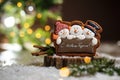 Holiday traditional food bakery. Gingerbread three fun snowmans in cozy warm decoration with garland lights