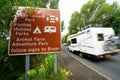 Holiday traffic passing tourist sign