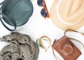 Holiday, travel background. Green cross bag, straw hat, retro brown sunglasses, grey scarf, retro camera, bocho bracelet