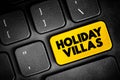 Holiday Villas are an alternative to traditional hotels or hostel accommodation, text button on keyboard, concept background