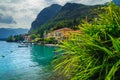 Holiday villas and boats on the shore of lake Como Royalty Free Stock Photo